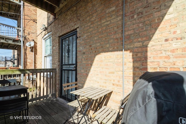 3540 S Prairie Ave Unit 1, Chicago, IL 60653 - wooden deck with grilling area