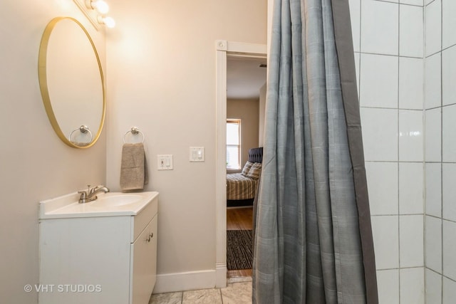 3540 S Prairie Ave Unit 1, Chicago, IL 60653 - bathroom featuring vanity, baseboards, ensuite bath, and a shower with curtain