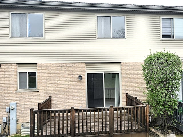 8660 Thomas Charles Ln, Hickory Hills, IL 60457 - back of house with brick siding and a deck