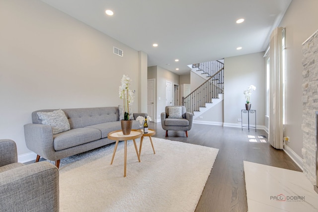 1296 Ashley Ct, Vernon Hills, IL 60061 - living area with dark wood finished floors, stairs, and recessed lighting