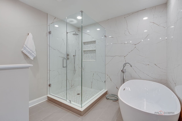 1296 Ashley Ct, Vernon Hills, IL 60061 - bathroom featuring a freestanding bath, a marble finish shower, tile patterned flooring, and recessed lighting