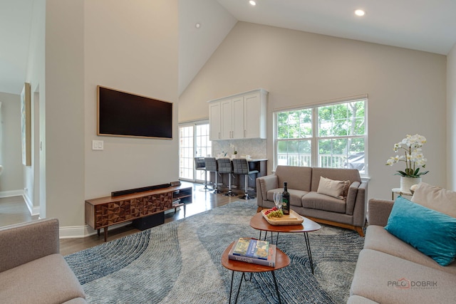 1296 Ashley Ct, Vernon Hills, IL 60061 - living room featuring high vaulted ceiling, recessed lighting, and wood finished floors