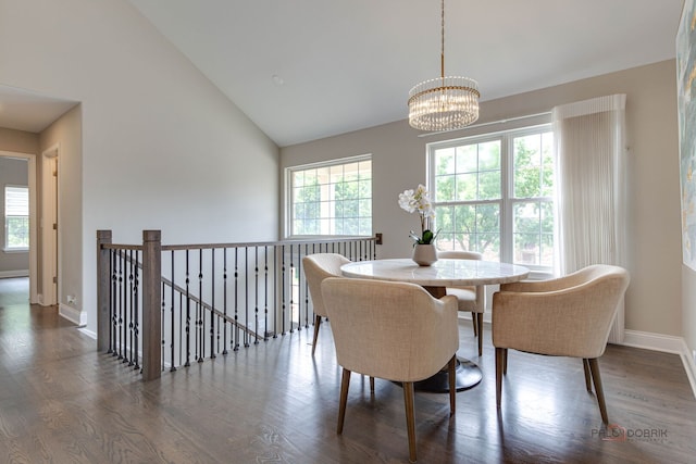1296 Ashley Ct, Vernon Hills, IL 60061 - dining area featuring a chandelier, dark wood-style floors, healthy amount of natural light, and high vaulted ceiling