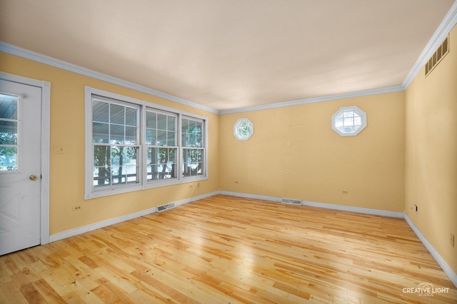 437 Holliday Dr, Lake Holiday, IL 60552 - empty room with wood finished floors, baseboards, and ornamental molding