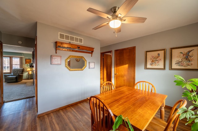 321 Cartwright Ln, Oregon, IL 61061 - dining space featuring baseboards, a ceiling fan, and wood finished floors