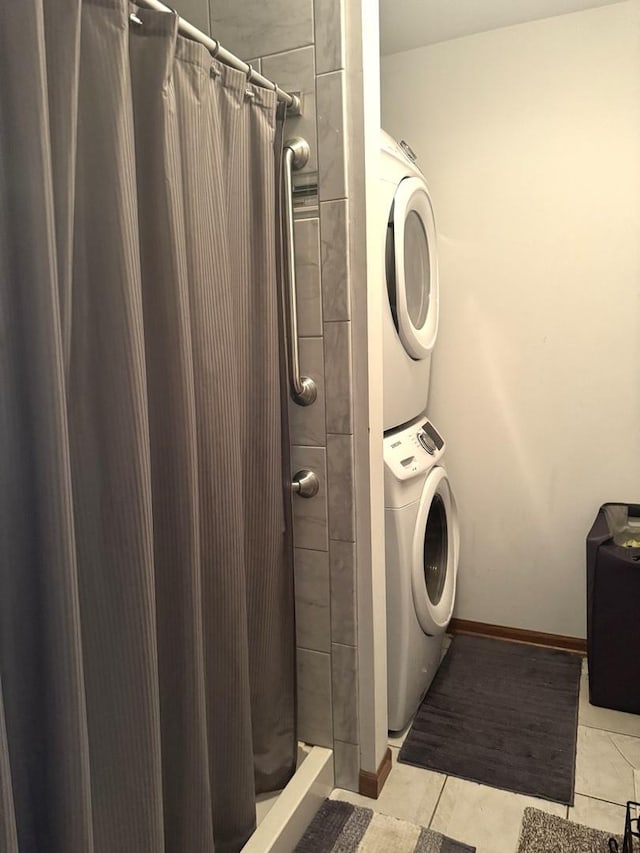 1012 Crestview Dr, Lemont, IL 60439 - washroom featuring stacked washer / drying machine and baseboards