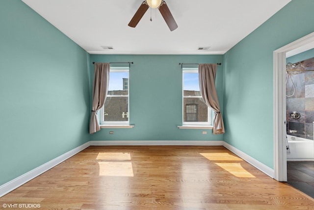 1114 W Pratt Blvd Unit 3S, Chicago, IL 60626 - spare room featuring ceiling fan and wood finished floors
