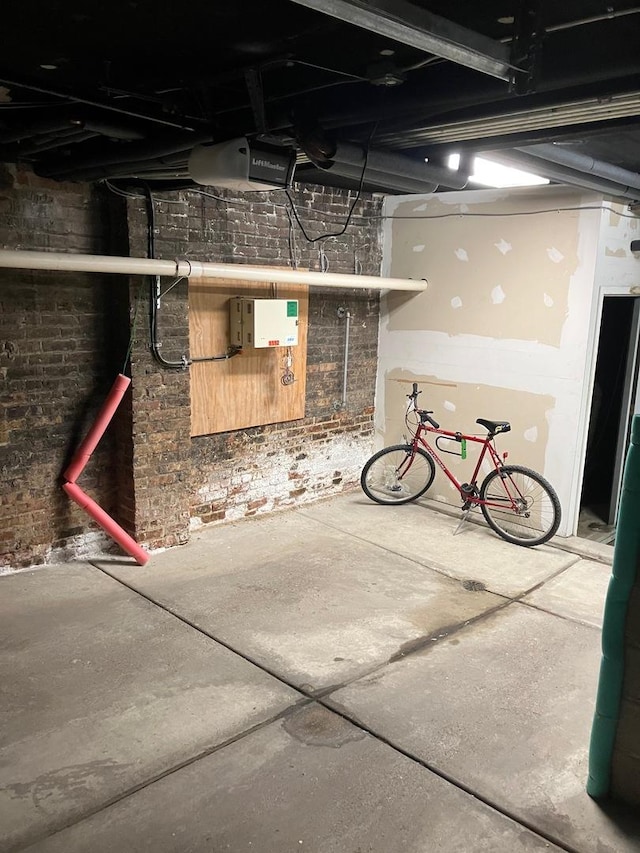 1114 W Pratt Blvd Unit 3S, Chicago, IL 60626 - unfinished below grade area with brick wall