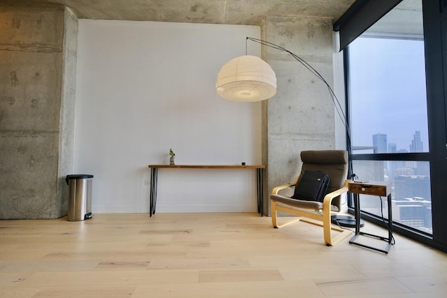 235 W Van Buren St Unit 4206, Chicago, IL 60607 - living area with healthy amount of natural light, wood finished floors, and a wall of windows