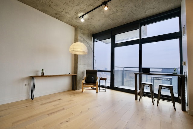 235 W Van Buren St Unit 4206, Chicago, IL 60607 - living area with floor to ceiling windows, wood finished floors, and track lighting