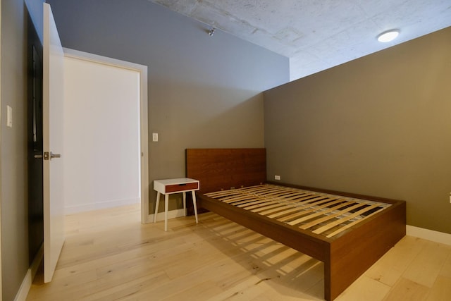 235 W Van Buren St Unit 4206, Chicago, IL 60607 - unfurnished bedroom with wood finished floors and baseboards