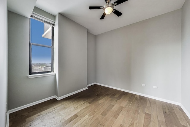 1464 S Michigan Ave Unit 1404, Chicago, IL 60605 - spare room with wood finished floors and a ceiling fan
