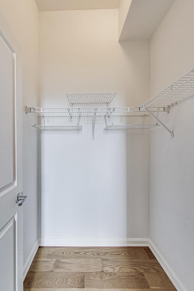 1464 S Michigan Ave Unit 1404, Chicago, IL 60605 - walk in closet with wood finished floors