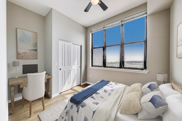1464 S Michigan Ave Unit 1404, Chicago, IL 60605 - bedroom featuring wood finished floors, an office area, a closet, and a ceiling fan
