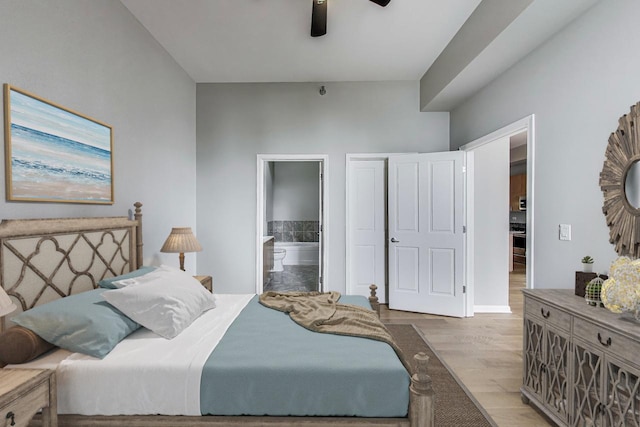 1464 S Michigan Ave Unit 1404, Chicago, IL 60605 - bedroom with wood finished floors, ensuite bathroom, and a ceiling fan