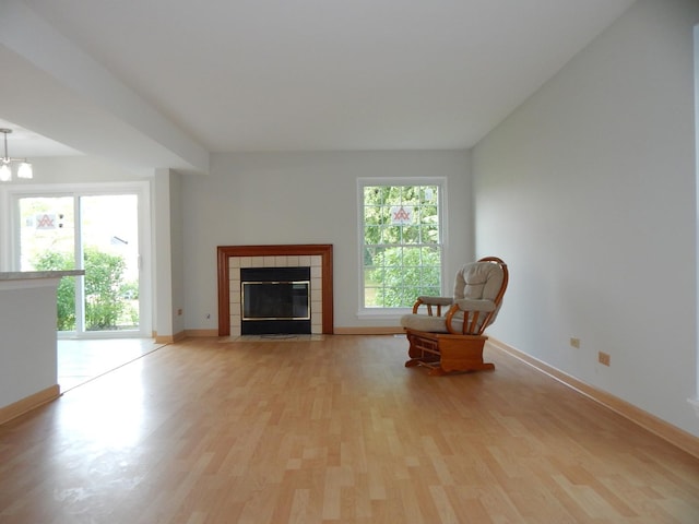 1 N Oltendorf Rd, Streamwood, IL 60107 - living room with light wood-style flooring and baseboards