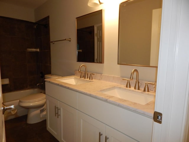1 N Oltendorf Rd, Streamwood, IL 60107 - bathroom featuring double vanity, toilet, and tub / shower combination