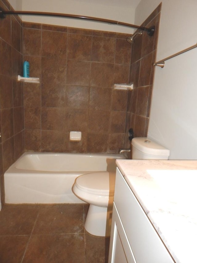 1 N Oltendorf Rd, Streamwood, IL 60107 - full bathroom with toilet, vanity, washtub / shower combination, and tile patterned floors