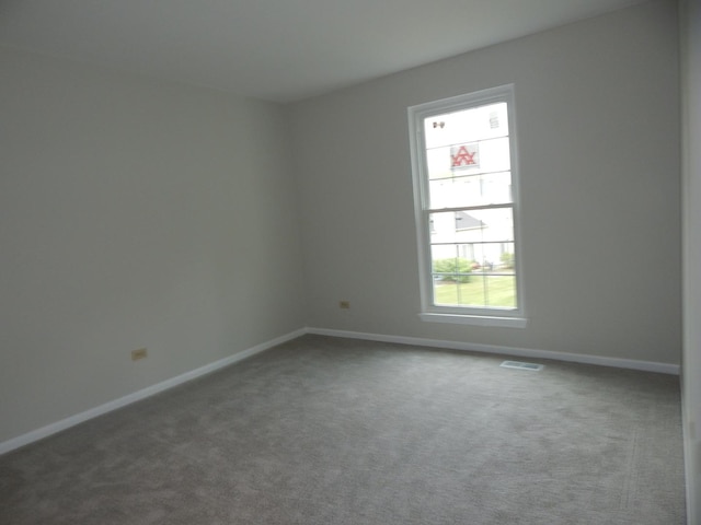 1 N Oltendorf Rd, Streamwood, IL 60107 - carpeted empty room with baseboards