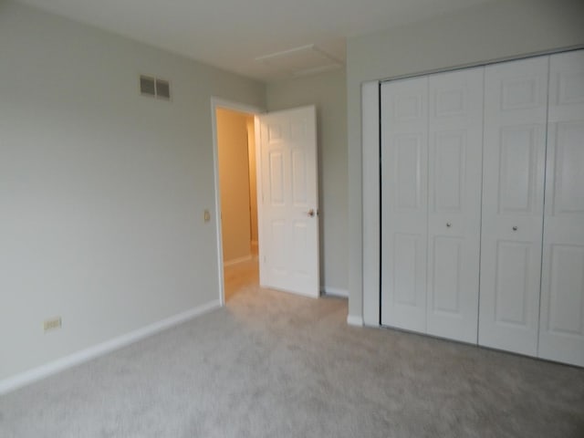 1 N Oltendorf Rd, Streamwood, IL 60107 - unfurnished bedroom featuring carpet, a closet, and baseboards