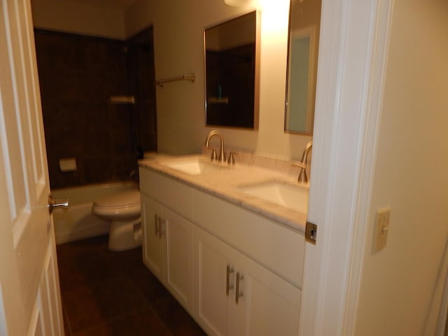 1 N Oltendorf Rd, Streamwood, IL 60107 - bathroom with toilet, double vanity, and tile patterned floors