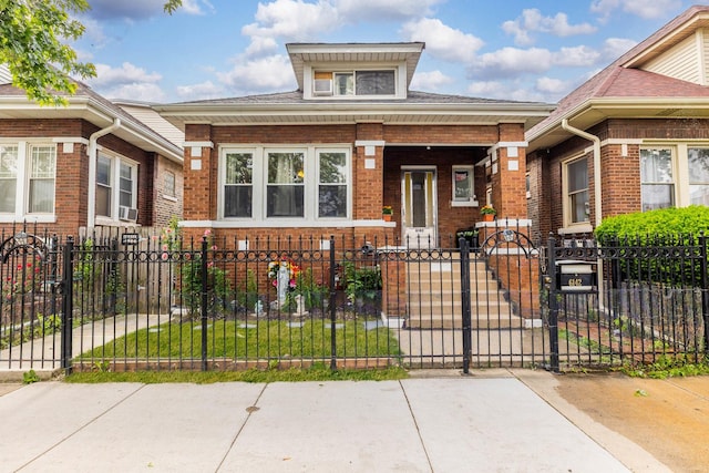 6142 S Richmond St, Chicago, IL 60629 - view of front facade featuring brick siding and a fenced front yard