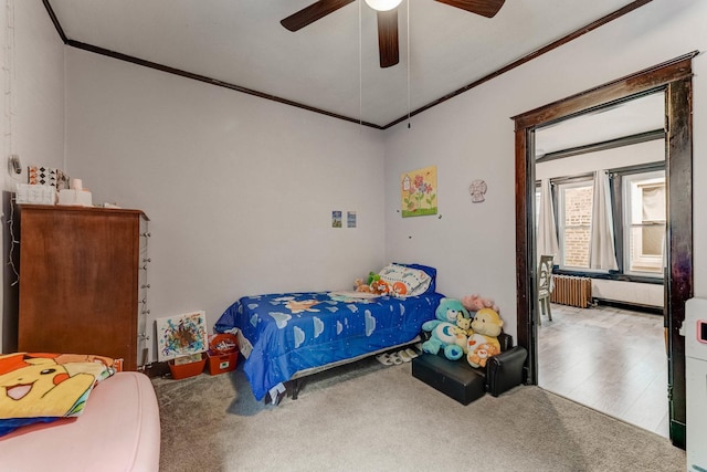 6142 S Richmond St, Chicago, IL 60629 - carpeted bedroom featuring radiator heating unit, crown molding, and a ceiling fan