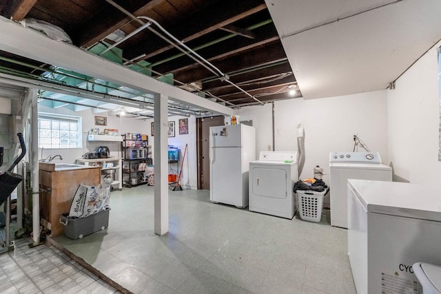 6142 S Richmond St, Chicago, IL 60629 - below grade area with freestanding refrigerator, independent washer and dryer, and light floors