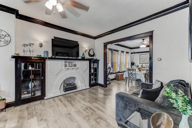 6142 S Richmond St, Chicago, IL 60629 - living area featuring a ceiling fan, crown molding, wood finished floors, and baseboards