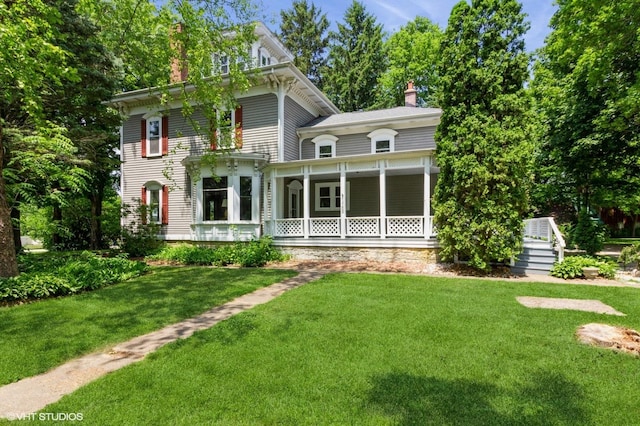 100 E Miller Ave, Hinckley, IL 60520 - view of front of house with a chimney and a front yard