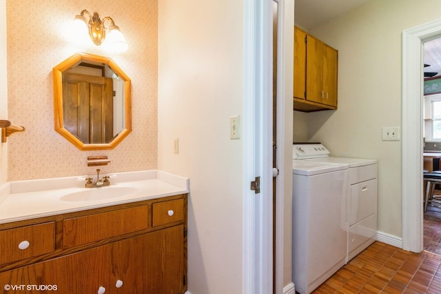 100 E Miller Ave, Hinckley, IL 60520 - bathroom featuring washing machine and dryer and vanity