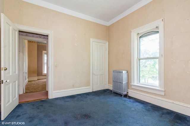 100 E Miller Ave, Hinckley, IL 60520 - unfurnished room with radiator heating unit, dark colored carpet, and crown molding