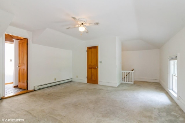 100 E Miller Ave, Hinckley, IL 60520 - additional living space with a baseboard heating unit, lofted ceiling, carpet floors, and a ceiling fan