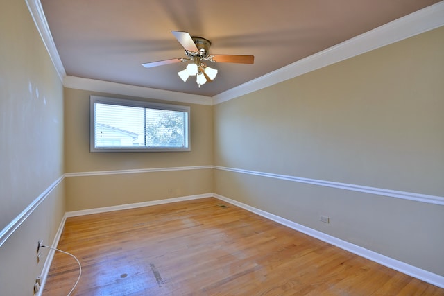 9044 N Clifton Ave, Niles, IL 60714 - unfurnished room with ornamental molding, light wood-style flooring, baseboards, and ceiling fan