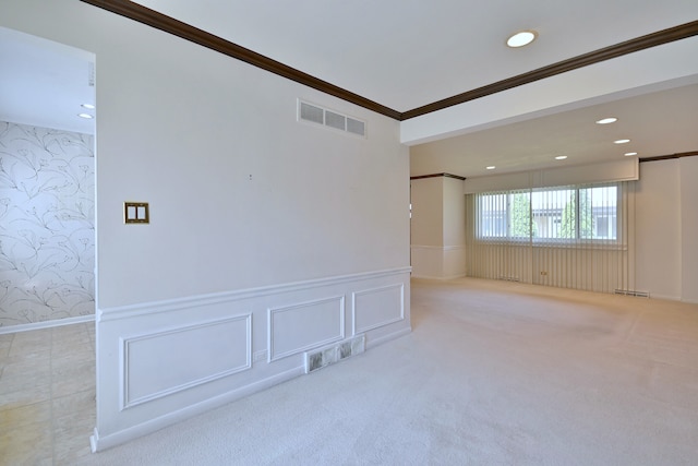 9044 N Clifton Ave, Niles, IL 60714 - carpeted empty room featuring wallpapered walls, a wainscoted wall, crown molding, recessed lighting, and a decorative wall