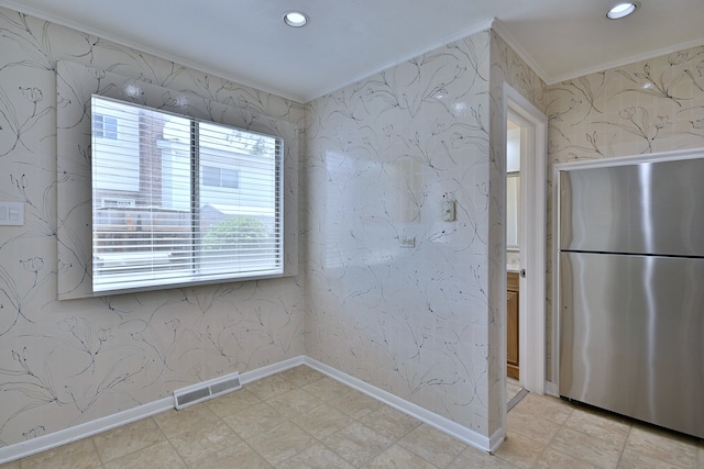 9044 N Clifton Ave, Niles, IL 60714 - unfurnished dining area featuring ornamental molding, recessed lighting, wallpapered walls, and baseboards