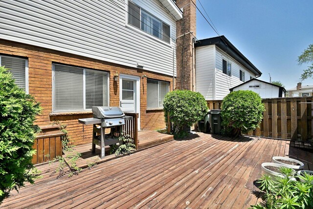 9044 N Clifton Ave, Niles, IL 60714 - deck featuring a grill