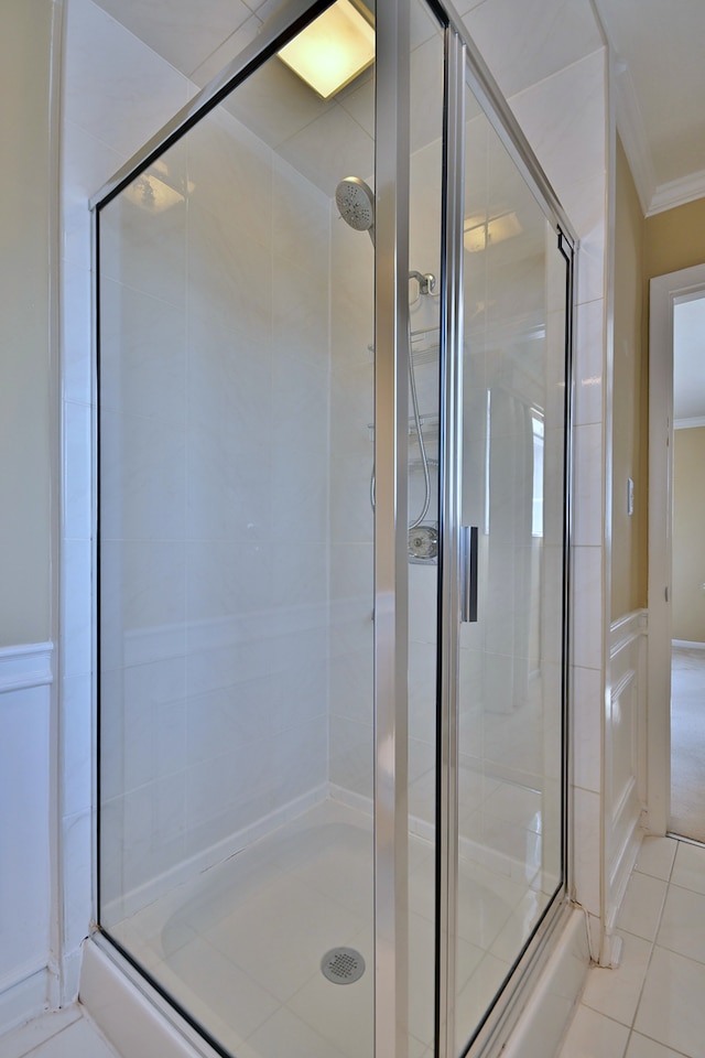 9044 N Clifton Ave, Niles, IL 60714 - bathroom with crown molding, a stall shower, and tile patterned flooring