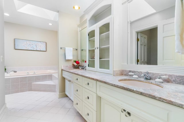 1455 Littlefield Ct, Lake Forest, IL 60045 - bathroom with tile patterned floors, double vanity, a garden tub, and recessed lighting