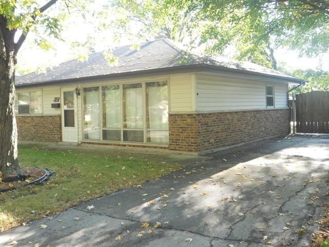357 Niagara St, Park Forest, IL 60466 - view of side of home featuring brick siding