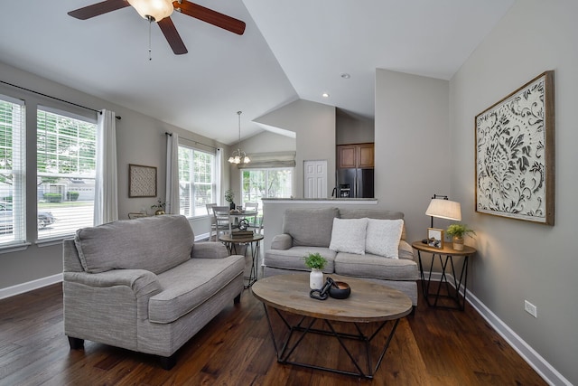 1850 Foxridge Ct, Aurora, IL 60502 - living room featuring lofted ceiling, dark wood-style flooring, ceiling fan, and a chandelier