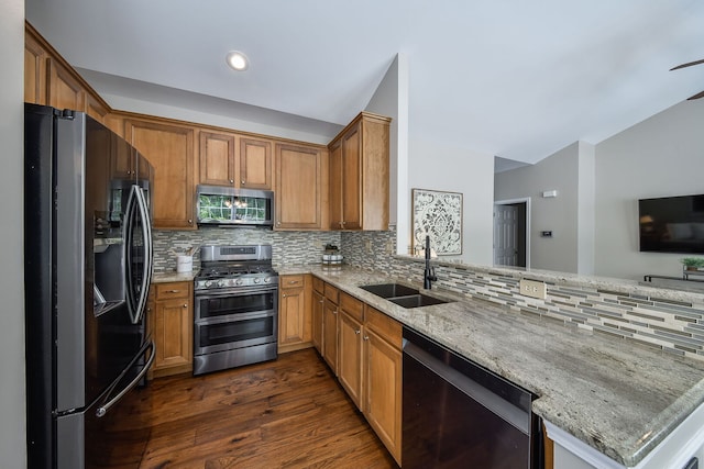 1850 Foxridge Ct, Aurora, IL 60502 - kitchen with stainless steel appliances, light stone countertops, decorative backsplash, dark wood-type flooring, and brown cabinets