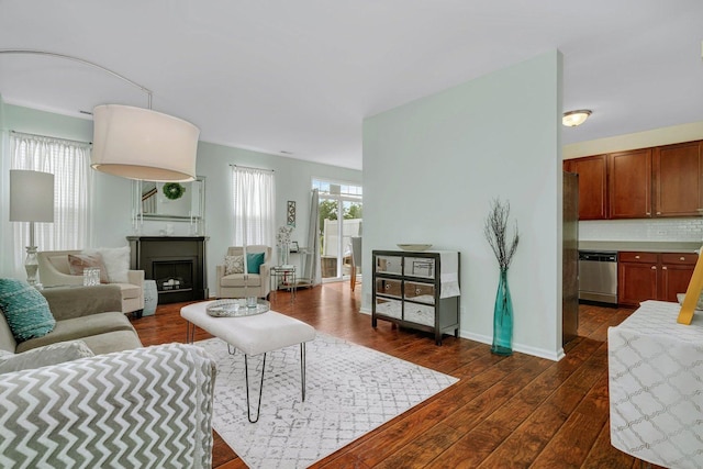 1106 Heron Cir, Joliet, IL 60431 - living area featuring a fireplace and dark wood-type flooring