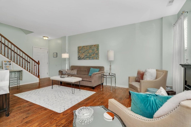 1106 Heron Cir, Joliet, IL 60431 - living room with hardwood / wood-style flooring, stairs, and baseboards