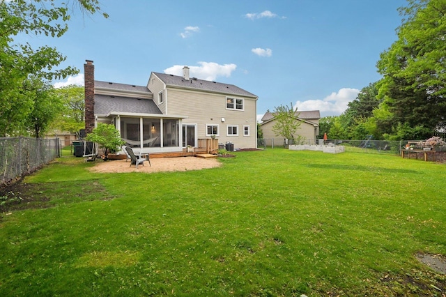 0N467 Cloos Ct, Winfield, IL 60190 - rear view of house with a sunroom, a fenced backyard, and a chimney