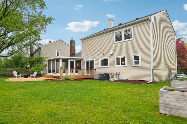 0N467 Cloos Ct, Winfield, IL 60190 - rear view of property featuring a sunroom, a patio, a deck, and a chimney