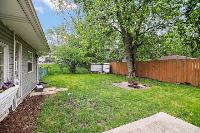 313 Dorsetshire Dr, Steger, IL 60475 - view of yard featuring an outdoor fire pit and a patio area