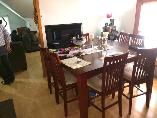 1415 N Maplewood Ave, Chicago, IL 60622 - dining room featuring light wood-style flooring