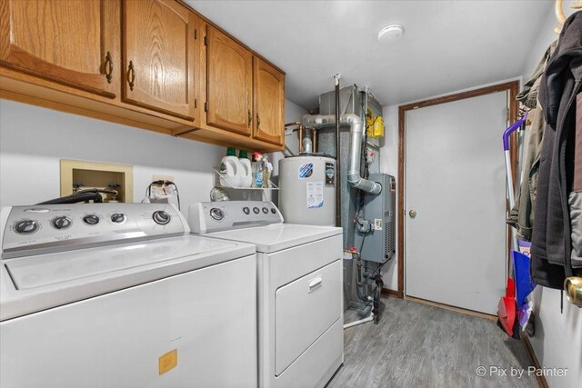 2116 Glasgow Ct, Hanover Park, IL 60133 - laundry area with washer and clothes dryer, water heater, light wood-type flooring, and cabinet space