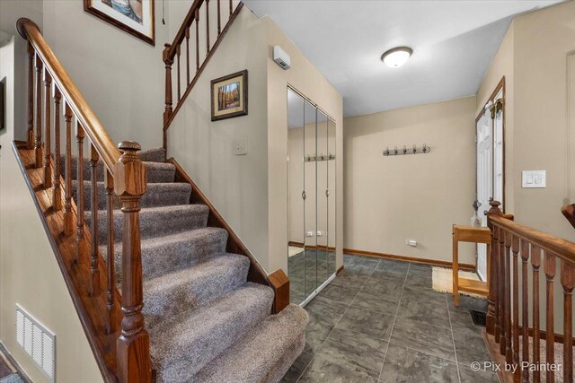 2116 Glasgow Ct, Hanover Park, IL 60133 - entrance foyer with stairs